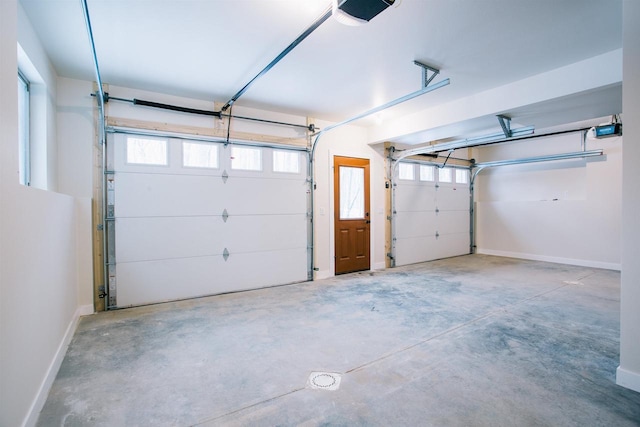 garage featuring a garage door opener