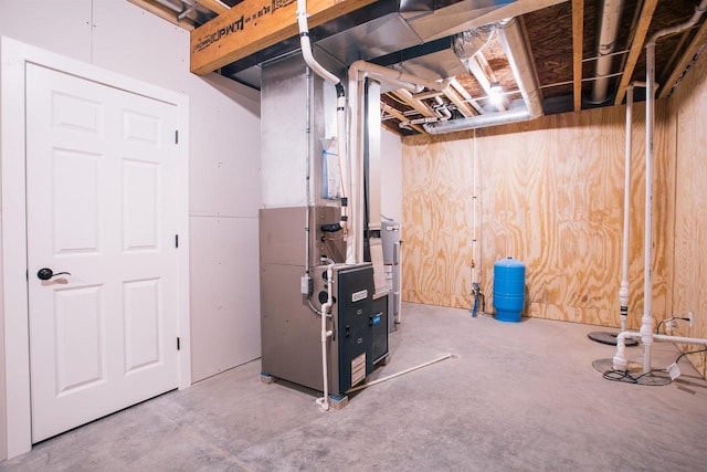 basement featuring heating unit