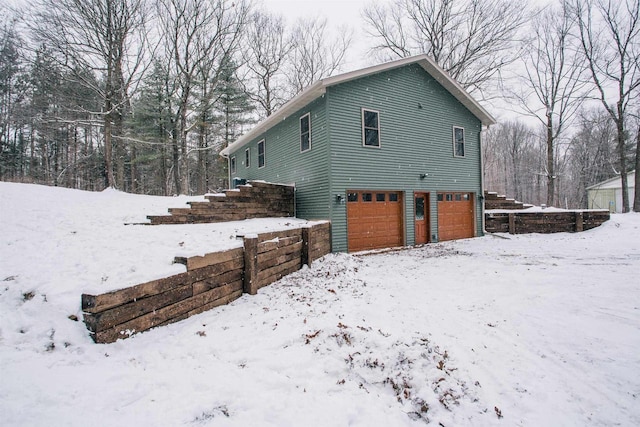 exterior space with a garage