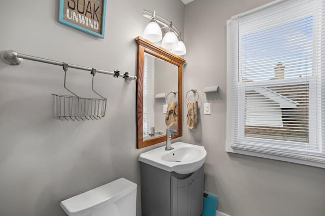 bathroom with vanity and toilet