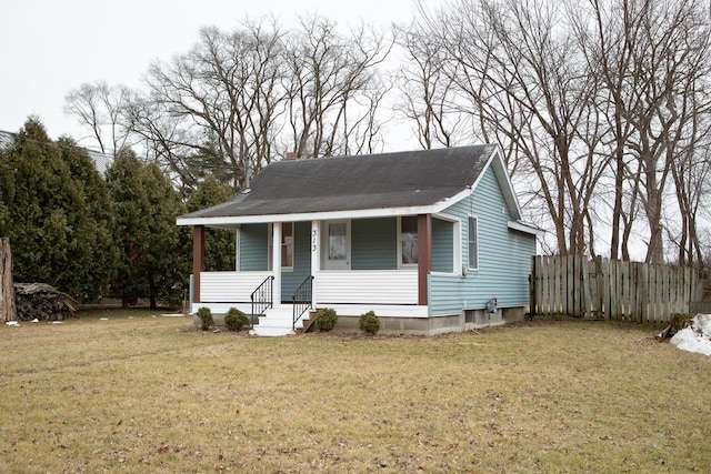 bungalow-style house with a porch and a front yard