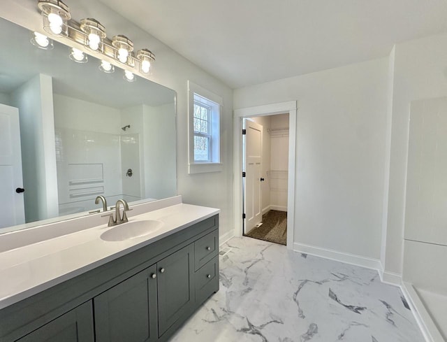 bathroom with vanity and walk in shower