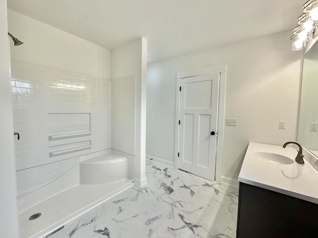 bathroom featuring vanity and walk in shower