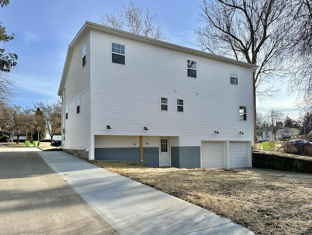 view of home's exterior with a garage