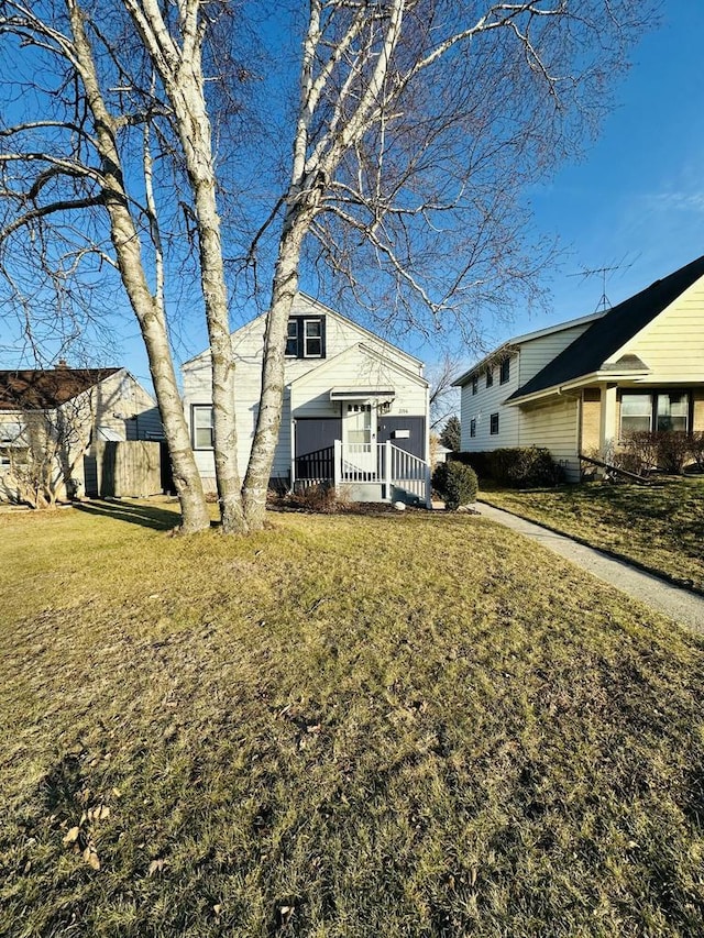 exterior space with a front lawn