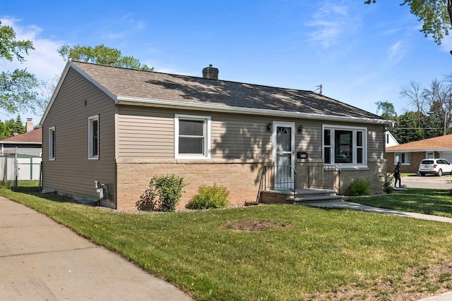 view of front facade with a front lawn