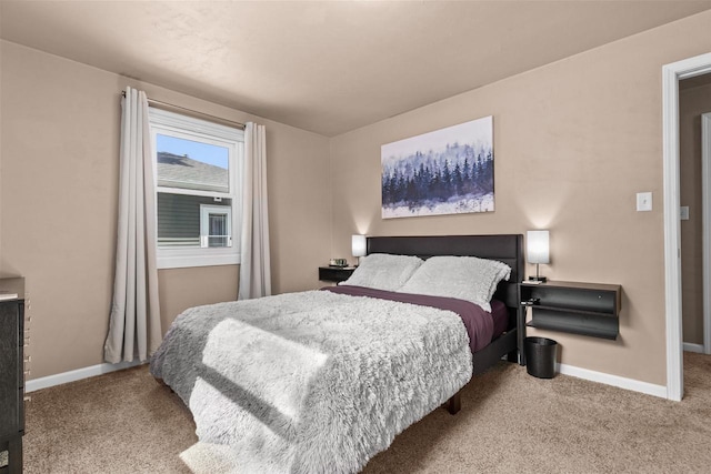 bedroom featuring carpet