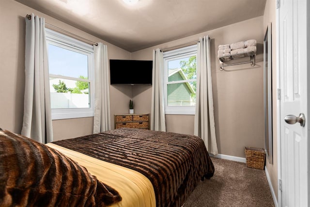 carpeted bedroom with vaulted ceiling