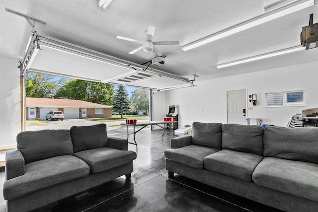 interior space with ceiling fan and concrete flooring