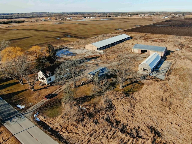 birds eye view of property featuring a rural view