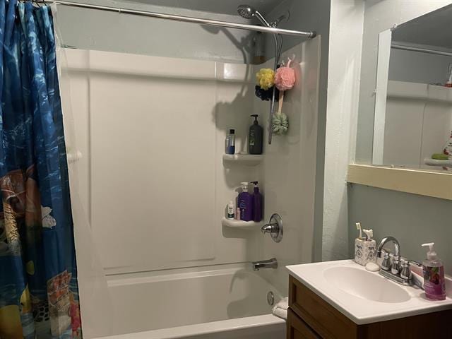 bathroom featuring vanity and shower / tub combo