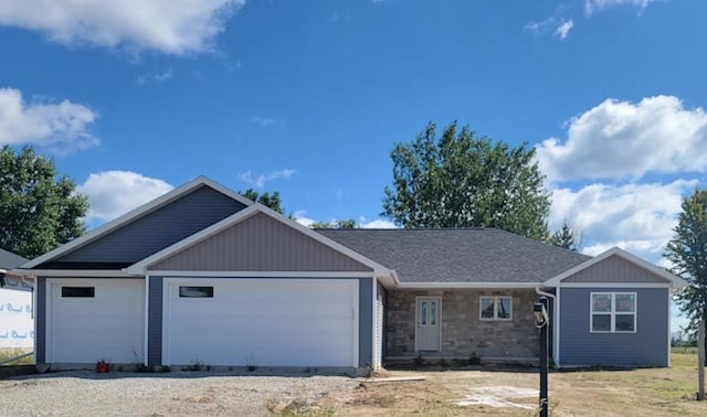 ranch-style home with a garage