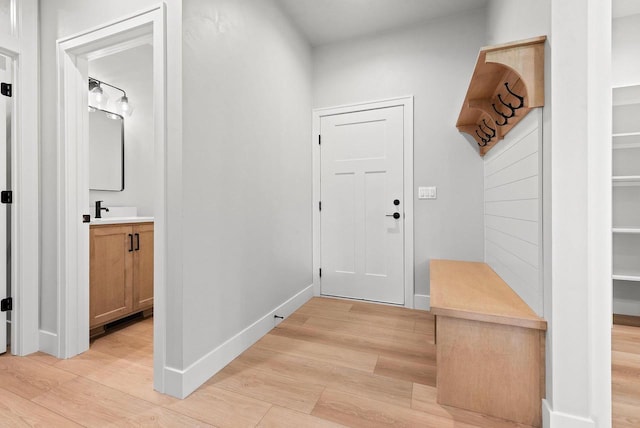 mudroom featuring light hardwood / wood-style floors