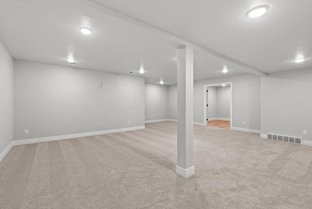 basement with light carpet