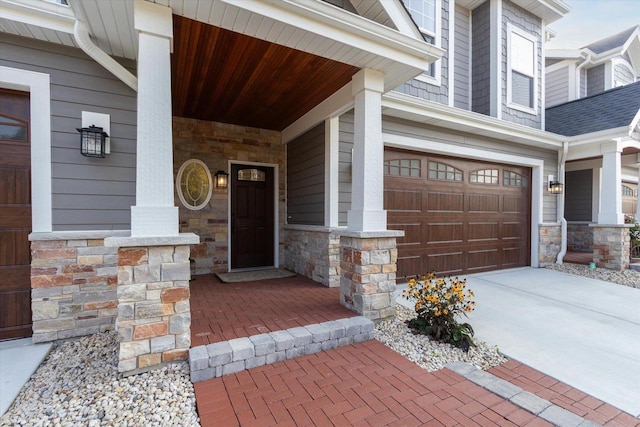 entrance to property featuring a garage