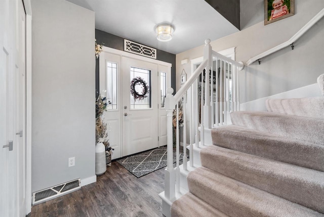 entryway with wood-type flooring