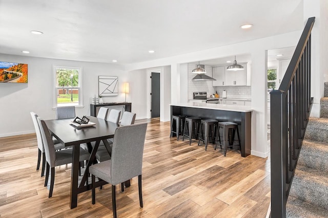 dining area featuring light hardwood / wood-style flooring