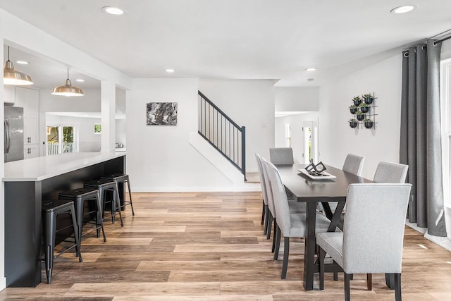 dining room featuring light hardwood / wood-style floors