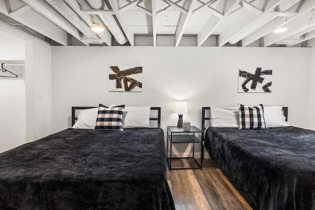 bedroom featuring hardwood / wood-style flooring