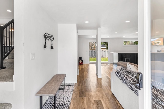 corridor featuring light hardwood / wood-style floors