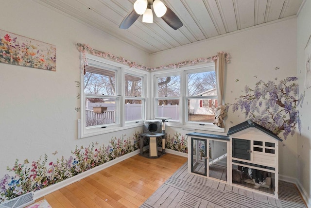 interior space with hardwood / wood-style flooring, ceiling fan, and wood ceiling