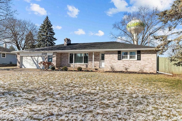 single story home featuring a garage