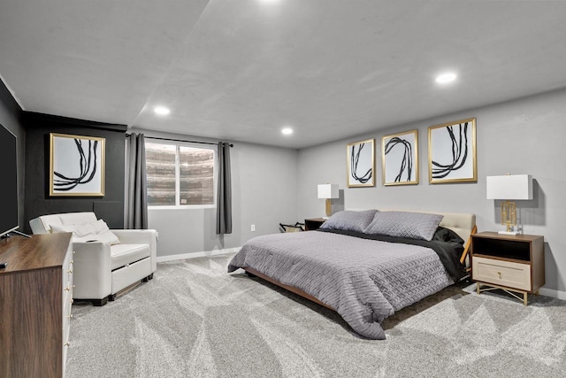 bedroom with light colored carpet