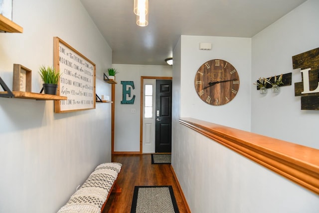 hall with dark wood-type flooring