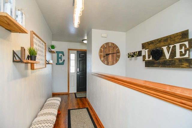 hall with dark wood-type flooring