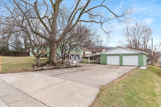 view of front of property with a front yard and a carport