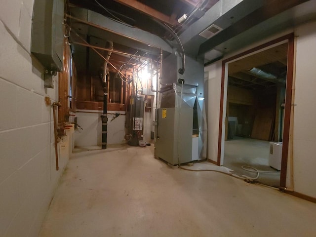 basement with heating unit and water heater