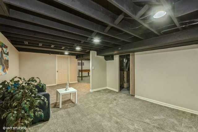 basement featuring carpet flooring