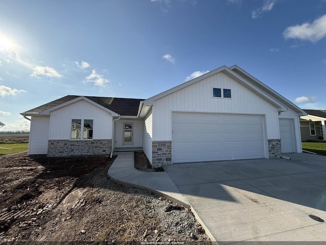 ranch-style home featuring a garage