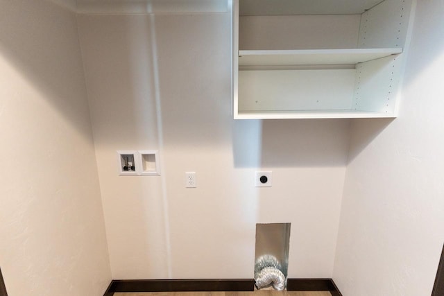 laundry area with wood-type flooring, washer hookup, and hookup for an electric dryer