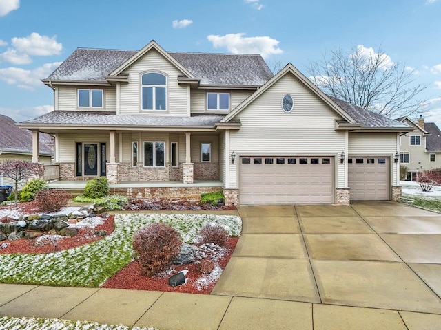 craftsman house with a garage and a porch