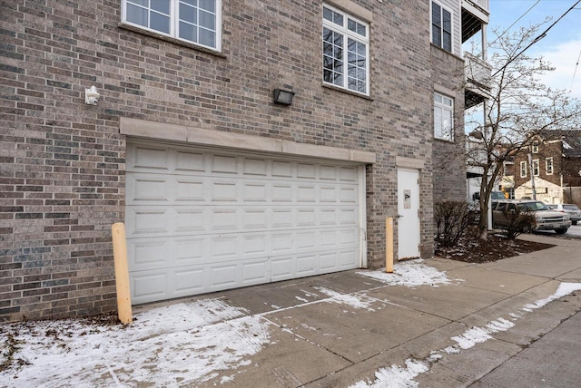 view of snow covered garage