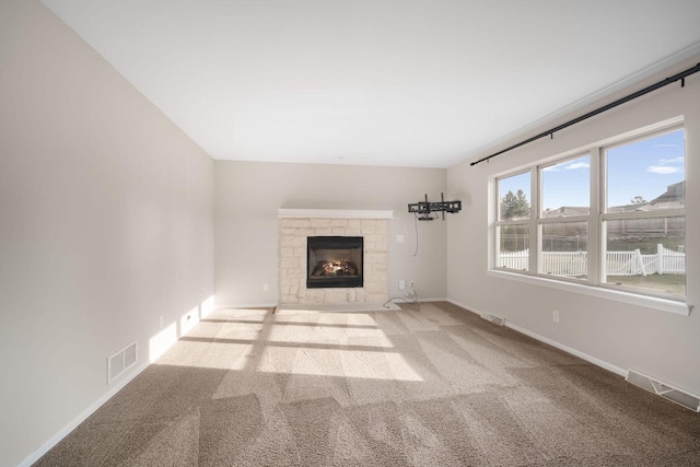 unfurnished living room with light carpet