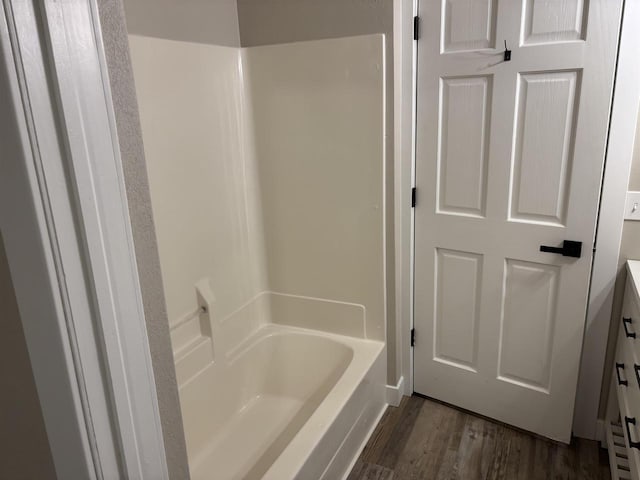 bathroom with hardwood / wood-style flooring and vanity