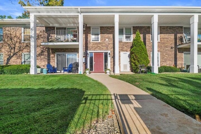 view of property with a front lawn