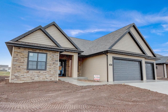 view of front of home with a garage