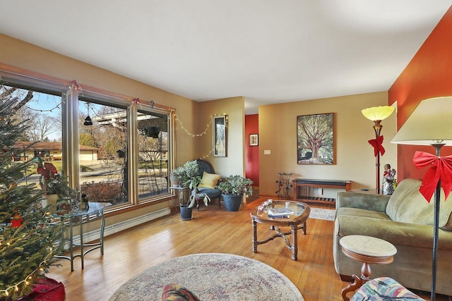 living room featuring hardwood / wood-style flooring and a baseboard radiator