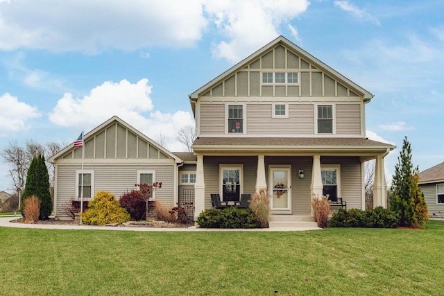 view of front of property featuring a front yard and a porch