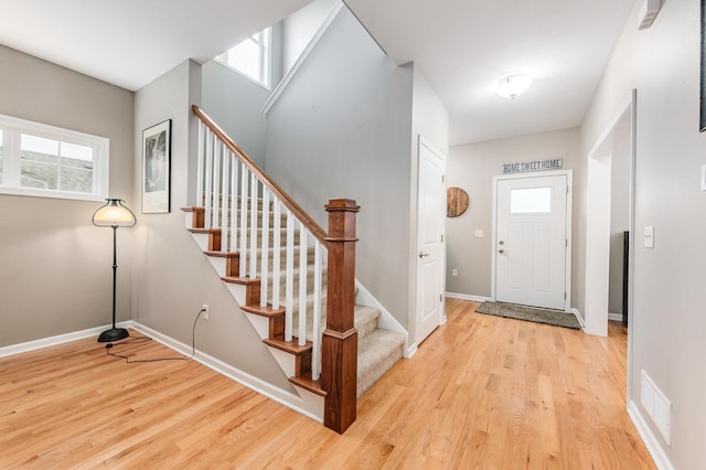 entrance foyer featuring light hardwood / wood-style floors