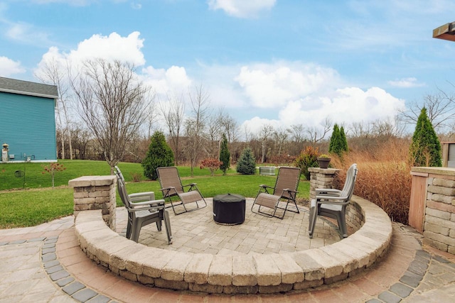 view of patio / terrace featuring a fire pit