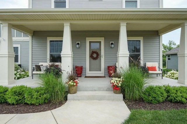 property entrance featuring covered porch