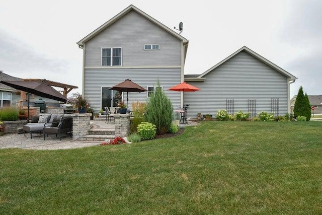 rear view of property featuring a patio area and a lawn