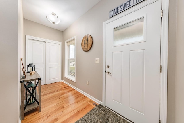 foyer with hardwood / wood-style floors