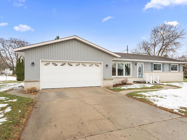 single story home featuring a garage