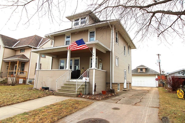 view of front facade featuring a porch, an outdoor structure, and a garage