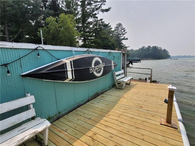 view of dock with a water view